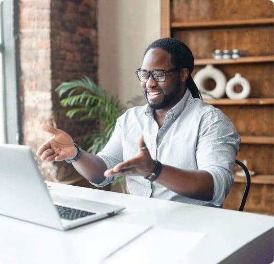 A man enjoying the Cardinal Financial culture by working remotely.